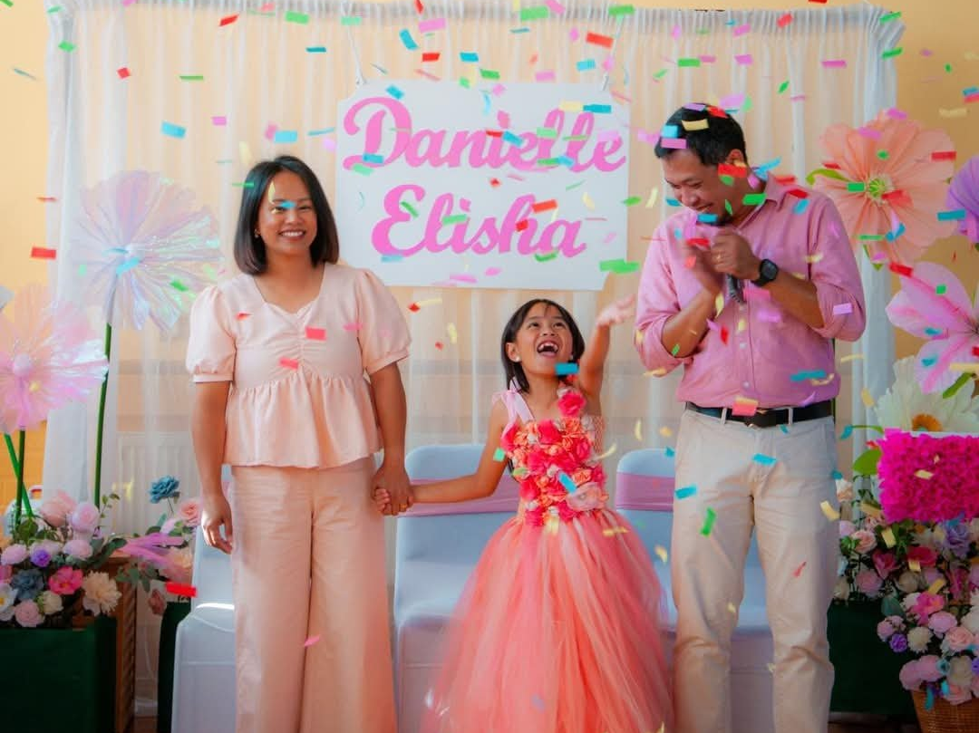Pastor Robert Guanco with his wife Isaeli and daugther Ellie
